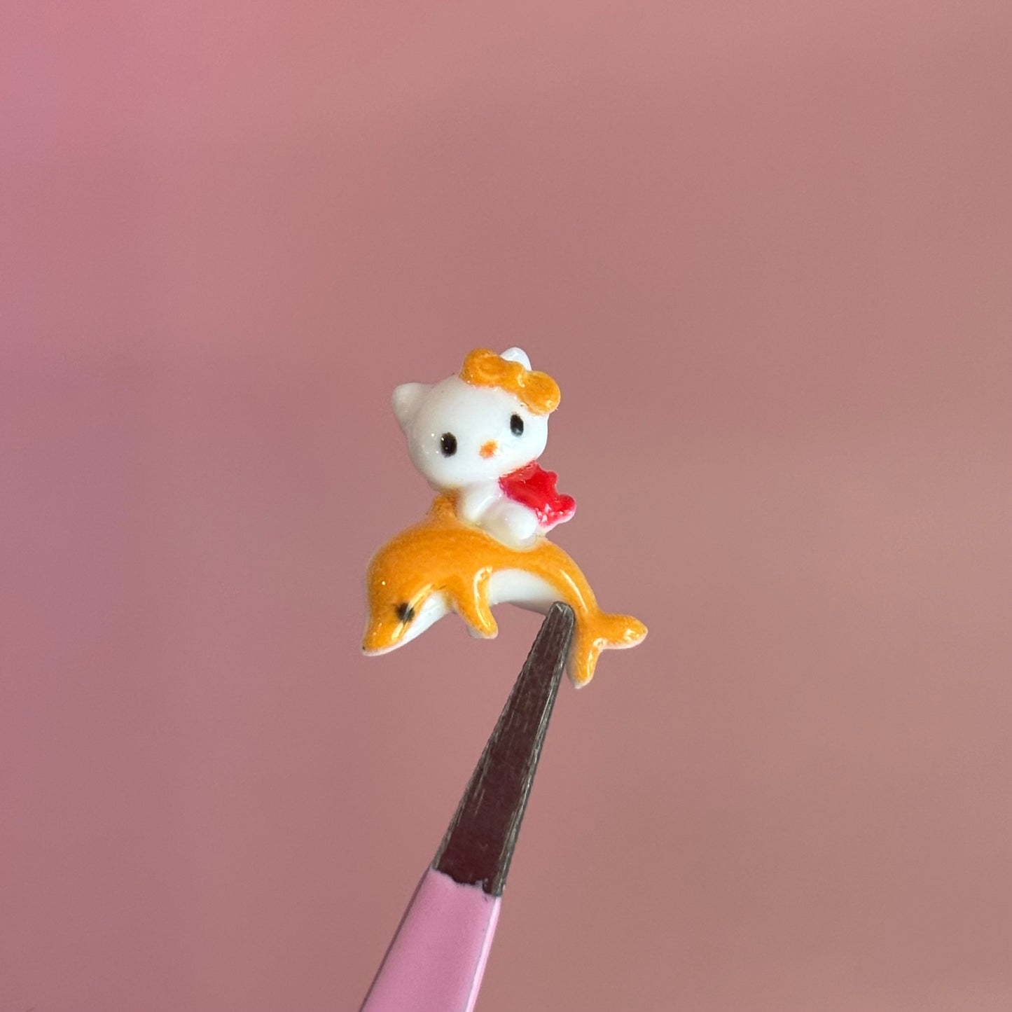 Kitty delfín naranja 2Uds